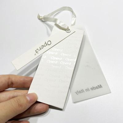 China Environmentally Friendly Customized  Luxury Clothing Garment Hanging Card Transparent Frosted Pvc Plastic Paper Hang Clothes Tags Luxury Hang Tag for sale