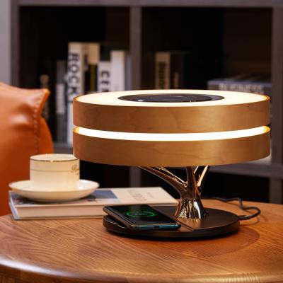 China 2021 Hot Selling Circle OEM Amazon European Light High End Bedroom Desk Lamp Wireless Charging Tree With Speaker Amazon Hot Selling Dr. for sale