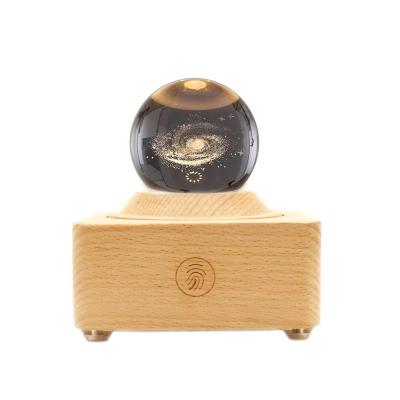 China Rotatable Bluetooth Music Box Crystal Music Box Music Night Light with LED Projection Light Mechanism 3D Moving Carving USB Wooden Bass Technology for sale