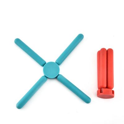 China Hotsale Multi Viable Purpose Heat Resistant Silicone Tripod Cutout Mat For Kitchen Accessories for sale