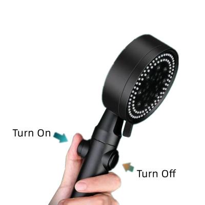 China Modern 5 Modes Water Shower Head Black Adjustable One-Key Stop Water Massage Saving High Pressure Shower Head For Bathroom for sale