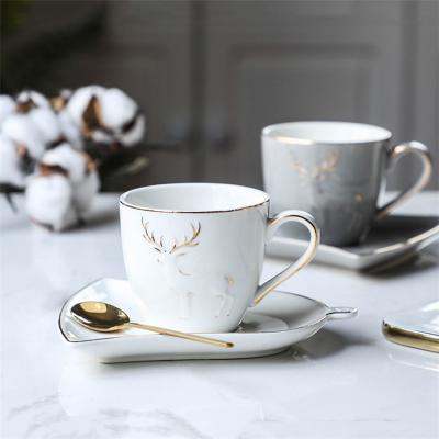 China Viable Gold Italian Fancy Rim Reindeer Style Ceramic Coffee Tea Cup And Saucer for sale