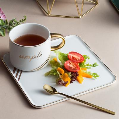 China Viable Square Shape Gold Popular White Edge Luster Ceramic Bulk Design Dish With Coffee Tea Cup for sale