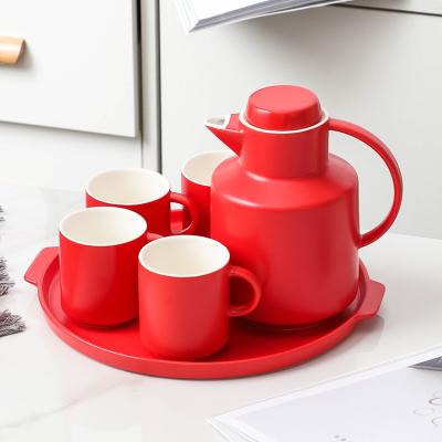 China Modern Red Elegant Porcelain Teapot Coffee Cup Ceramic Porcelain Tea Sets With Round Tray for sale