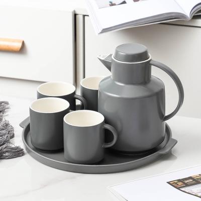 China 2020 New Arrivals Modern Elegant Gray Color Teapot Coffee Cup Ceramic Nordic Tea Set With Tray for sale