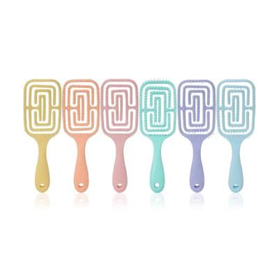 China For Home Use Baihe Hair Care Pink Color Plastic Yellow Blue Plastic Cavity Comb Comfortable Loose Hair Brushes for sale