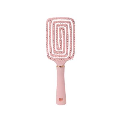 China Waterproof Hot Hair Detangler Brush Comb Paddle Massage Detangle Sweeps Natural Curly Magic Hair Detangling Hair Brush Plastic Pink for sale