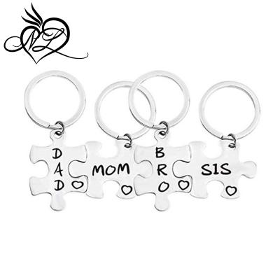 China Unisex Family Puzzle Piece Keychains Connecting 4 Keychains for sale