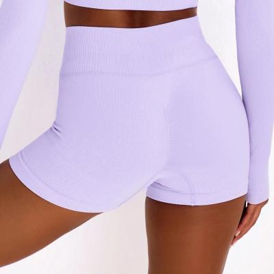 China Solid Color Women's Gym Wear Drawstring Waist Fitness Sport Active Mid Waist Ribbed Yoga Tight Shorts for sale