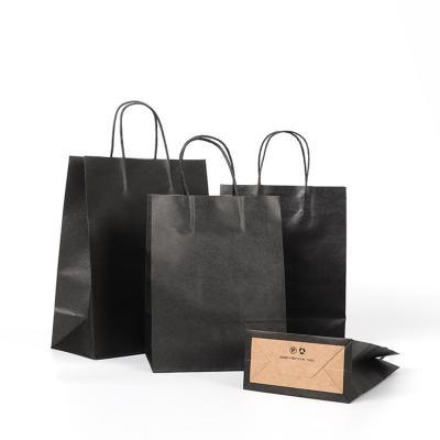 China Recycled Materials Black Thick High Capacity Shop Takeout Grocery Printing Reusable Portable Folding Kraft Paper Shopping Paper Bag for sale