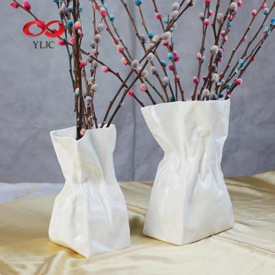 China Hot-selling modern simple bone china vase single fold shape ceramic vase five star hotel layouts for sale