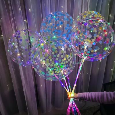 China 20 inch Stretchable Printed Confetti Bobo Clear Bubble Balloons YH Globo Burbuja Bobo Toy for sale