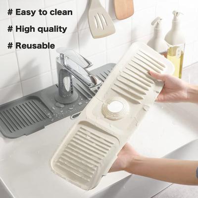 China Durable Bathroom Water Catcher Mat Sink Draining Pad Faucet Countertop Guard Mat For Kitchen Sink Splash Silicone Drip Protector for sale