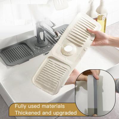 China Amazon Success Silicone Drain Cover Kitchen Sink Faucet Splash Drain Guard Viable Silicone Mat for sale