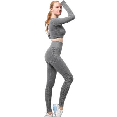 China Workable quick-drying tight seamless yoga set women's sports fitness suit long peach sheathed upper buttocks yoga pants sexy women clothing for sale