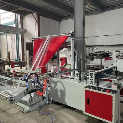 China High Speed ​​Plastic Bag PP BOPP Plastic Bag Edge Folding& Winding Machine for sale