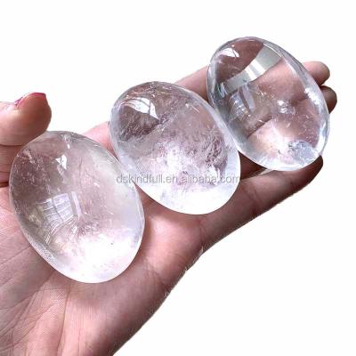 China China wholesale natural clear quartz palm white crystal stone for healing energy crystal stone for sale