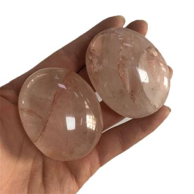 China China Wholesale Natural Hand Polished Red Gum Flower Palm Oval Crystal Chakra Stones for sale