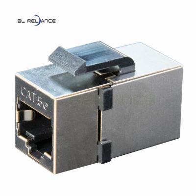 China 180 tipo en línea trapezoidal del acoplador del grado Cat5e Tooless RJ45 Jack 8p8c FTP en venta