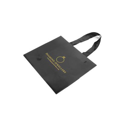 China Recyclable Black Gloss Boutique Paper Carrier Bags With Ribbon Handles for sale