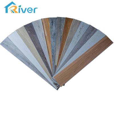 China Interlocking wood vinyl pvc spc floor tile flooring traditional waterproof interior wood vinyl plank for sale