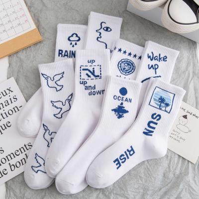 China new design printed white running walking crew sports socks for man women for sale