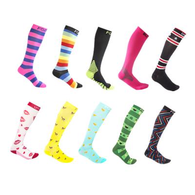 China custom sports football socks quick-drying long-tube running sports compression socks for sale