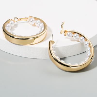 China FASHIONABLE exaggerated creative c-shaped earrings combine thick pearl circle earrings for sale