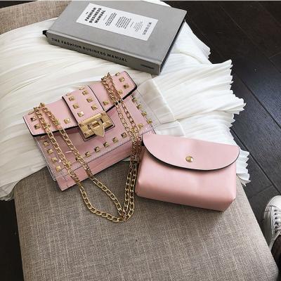 China Vintage PVC Rivet Handbag And Jelly Bag Satchel Transparent Chain Handbag Business Profile for sale