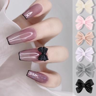 China Nail accessories wholesale nail bow decoration style bow nail accessories resin aurora bow nail art mixed design for sale