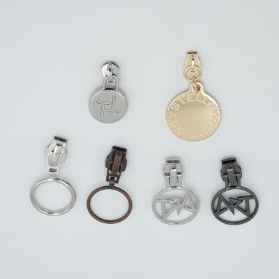 China Custom Brand Nickel Free Logo Bag Zipper Head Puller Zipper Puller Garment Metal Zipper Puller Slider for sale