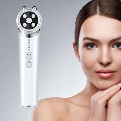 China Wrinkle Remover RF Pore Remover Face Acne Marks Removal Beauty Device EMS Anti Aging Facial Device for sale