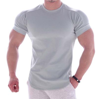 Cina Anti-wrinkle T-shirt Cotton Accept OEM White Solid Color Curved Edge Mens T-shirts in vendita