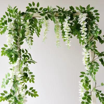 China Wed artificial rattan plastic air conditioning rattan flower ceiling winding home decoration strip wisteria green plant for sale