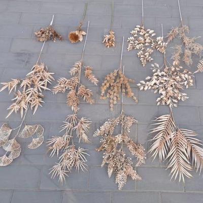 China Ginkgo Plastic Gold Leaf Artificial Flowers Wedding Fan Leaf Decoration New Year's Eve Flower Gold Wholesale for sale