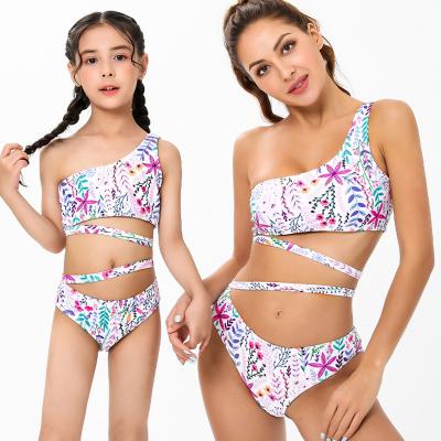 China 2022 Removable Padded Nine Piece Swimsuit Matching Cavity Off Top Cut Out Family Swimwear Women Girl Kids Swimwear for sale