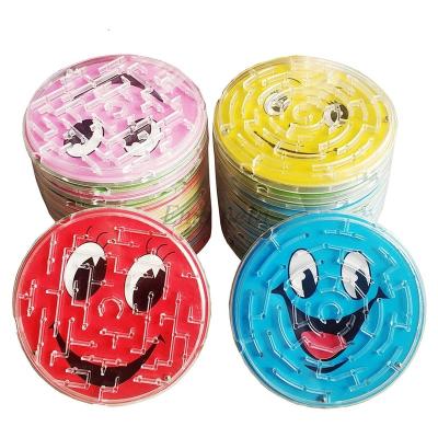 China Novelty Children Brain Teaser Intellectual Smile Handheld Steel Ball Track Early Educational Plastic Maze Game 3D Jigsaw Puzzle Toy for sale