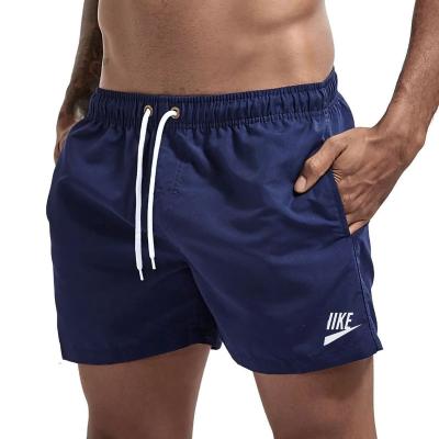 China Wholesale Custom Logo Summer Beach Elastic Swimwear Anti-wrinkle Quick Dry Men's Swim Shorts With Pocket Beach Shorts for sale