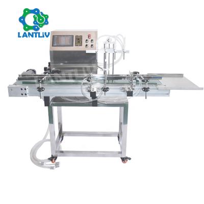 China Automatic Liquid Food Table Top Desktop Filling Machine 4 Heads With Conveyor Belt For Perfume Filling Machine Water Filler for sale