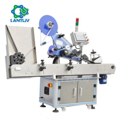 China Automatic Small Vial Ampoules Bottle Top Surface Food Sticker Labeling Machine Horizontal Type Ampoule Labeling Machine With Feeder System for sale