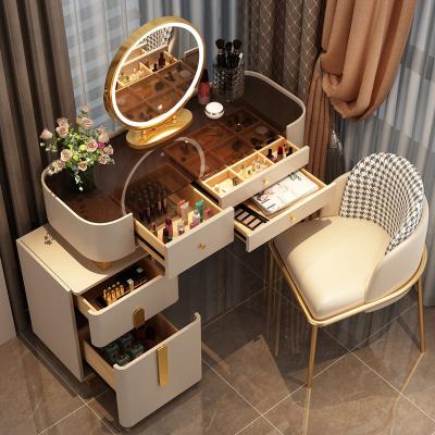 China Nordic modern dressing table with mirror and stool for bedroom dressing table with 3 LED light effect reflect iron gold dresser for sale