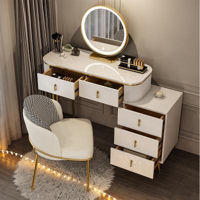 China Nordic modern dressing table with mirror and stool for bedroom dressing table with 3 LED light effect reflect iron gold dresser for sale