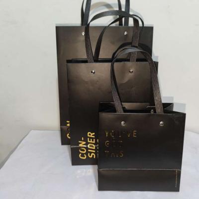 China China Custom Handled Logo Printed Gift Luxury Shopping Paper Bag for sale