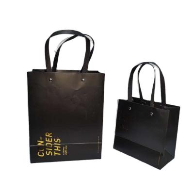 China Recyclable Custom Luxury Garment Gift Paper Shopping Bags With Logo Print Hot Sale for sale