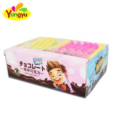 China Color Chocolate Candy Pack of Chocolate Liquid Snacks Double in Toy Syringe for sale