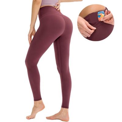 China New Style Customized Gym Waist Hip Lift Ladies Seamless Indoor Sports High Waisted Soft Tights Yoga Pants With Pockets for sale