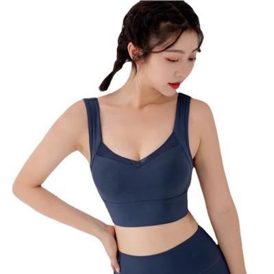 China Other factory wholesale women's underwear gym yoga u-shape beauty back widened chest sports bra wrapped parcel for sale