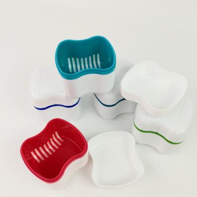 China Dentures box hot sale colorful portable European style pp material biodegradable denture orthodontic box for sale