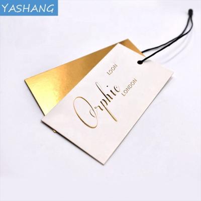 China paper & White Cardboard Gold Foil Full History Card Customized Simple Gold Foil Fancy Clothing Label Customized Label for sale