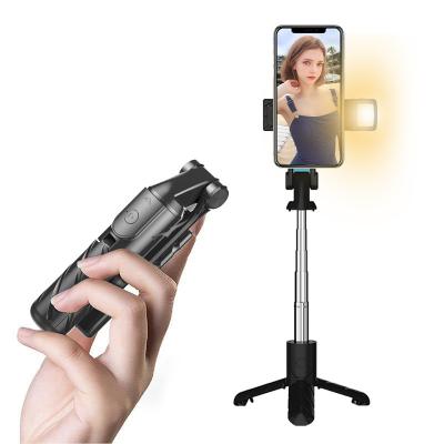 China Lightweight Detachable and Extendable Selfie Stick Tripod Phone Tripod for Cell Phone Handheld Telescopic Fill light Bluetooth Selfie Stick for sale